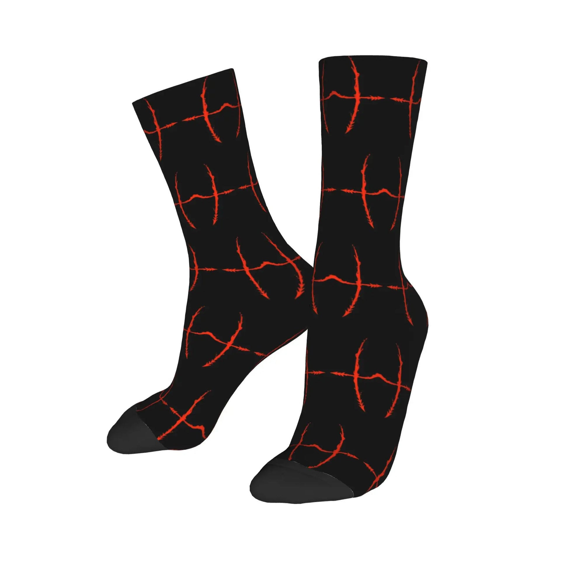 Paire de chaussettes noires à motifs rouges en lignes croisées