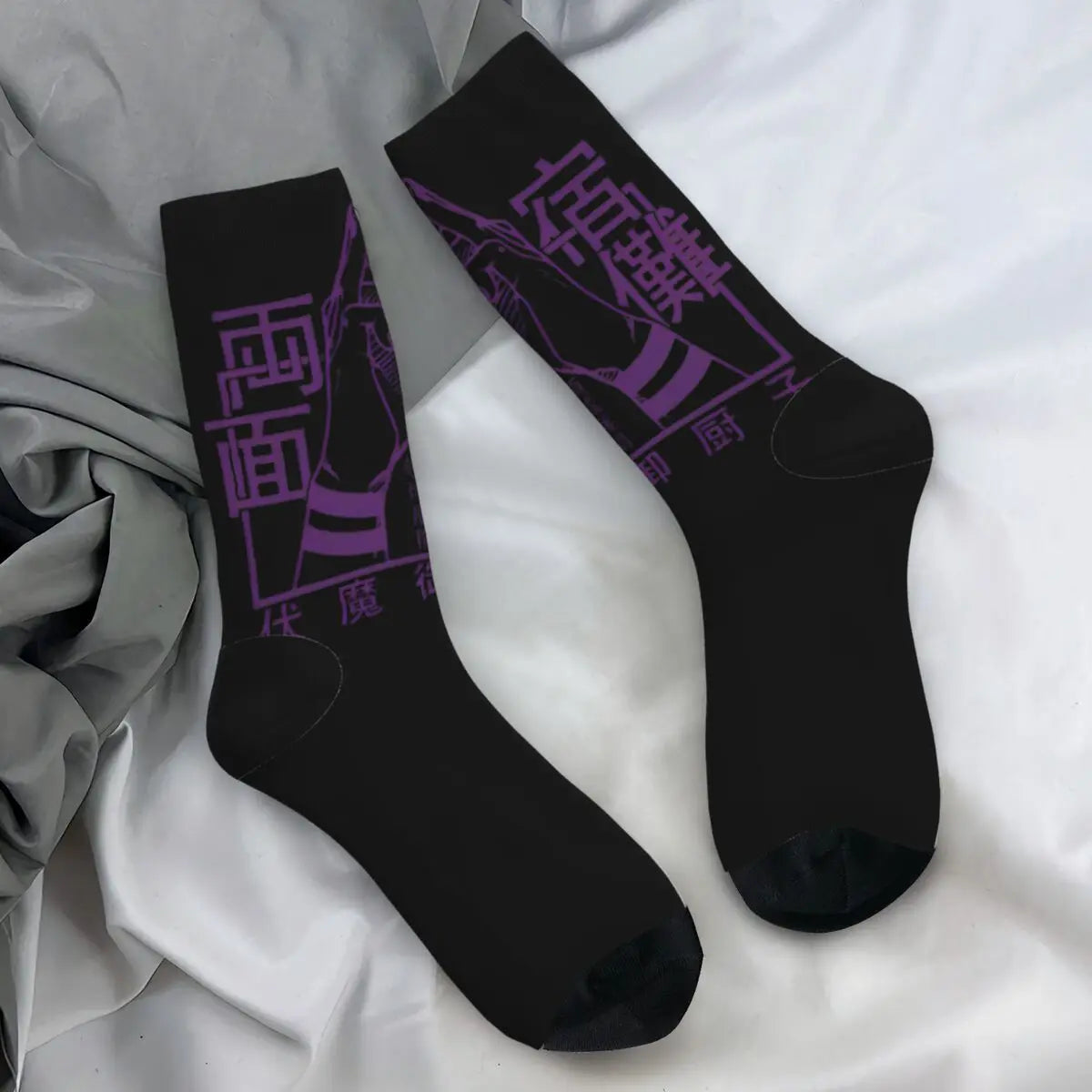 Two black crew socks with purple graphic on the shin, Extension Du Territoire print