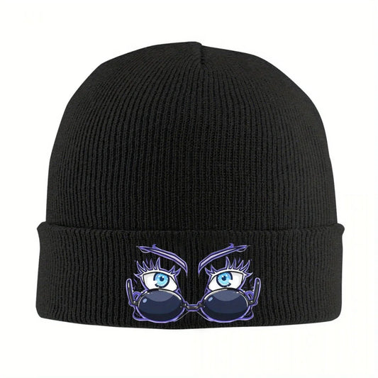Bonnet tricot noir, bord côtelé, logo de personnages bleus sur le revers