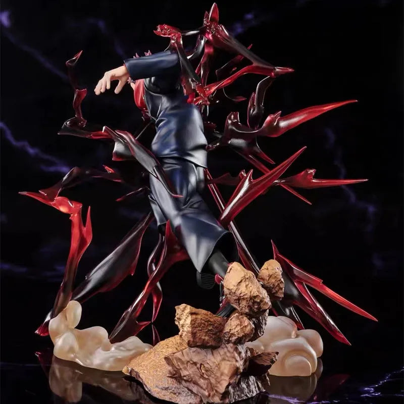 Figurine Démon Aura : tenue bleu foncé brillante, cheveux roses, pics rouges autour, rochers au socle
