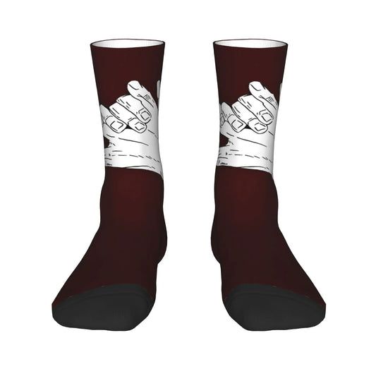 Chaussette bordeaux sombre avec motif blanc, bout et talon noirs.