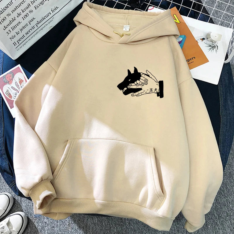 Sweat à capuche beige avec poche kangourou et motif de loup noir sur la poitrine
