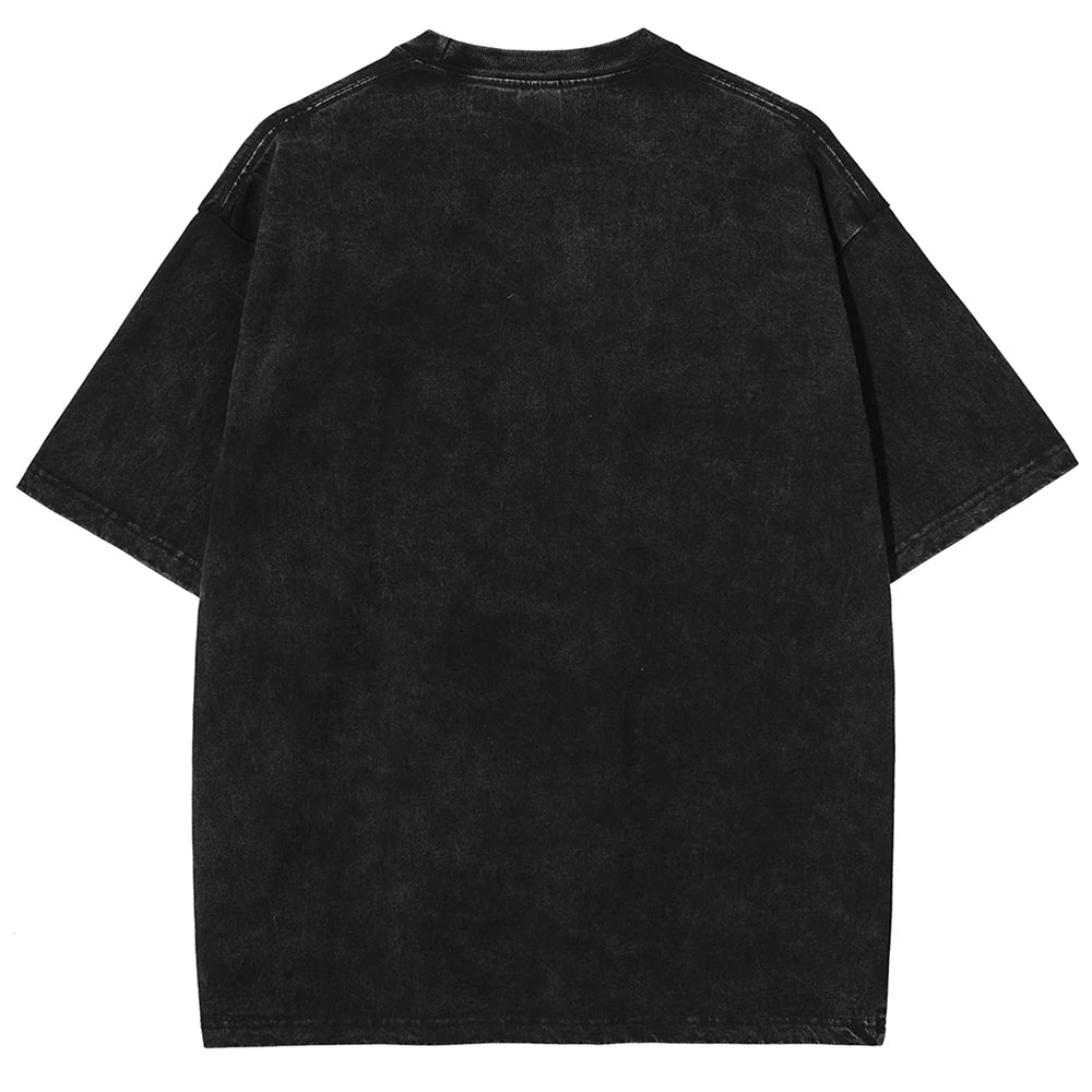 T-shirt noir col rond, dos uni avec effet délavé, sans motif visible.