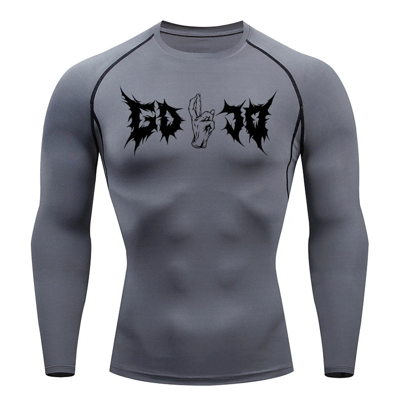 T-shirt de compression gris à manches longues, imprimé noir et blanc sur le torse.